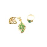 Jade and diamond ring, central oval cabochon cut jade, 8.9 x 7.1mm, with diamond set shoulders,