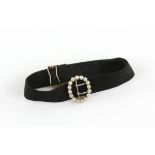 Victorian pearl and material bracelet, black woven strap with a seed pearl buckle and 15 ct clasp,