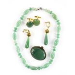 A mixed group of items, including an aventurine quartz bead necklace with round and elongated beads,