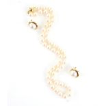 Pearl necklace, fifty 7.4-7.5mm cream pearls, strung knotted, on an 18 ct gold ball clasp,