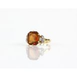 Citrine and diamond dress ring, central rectangular step cut citrine, estimated weight 3.59 carats,