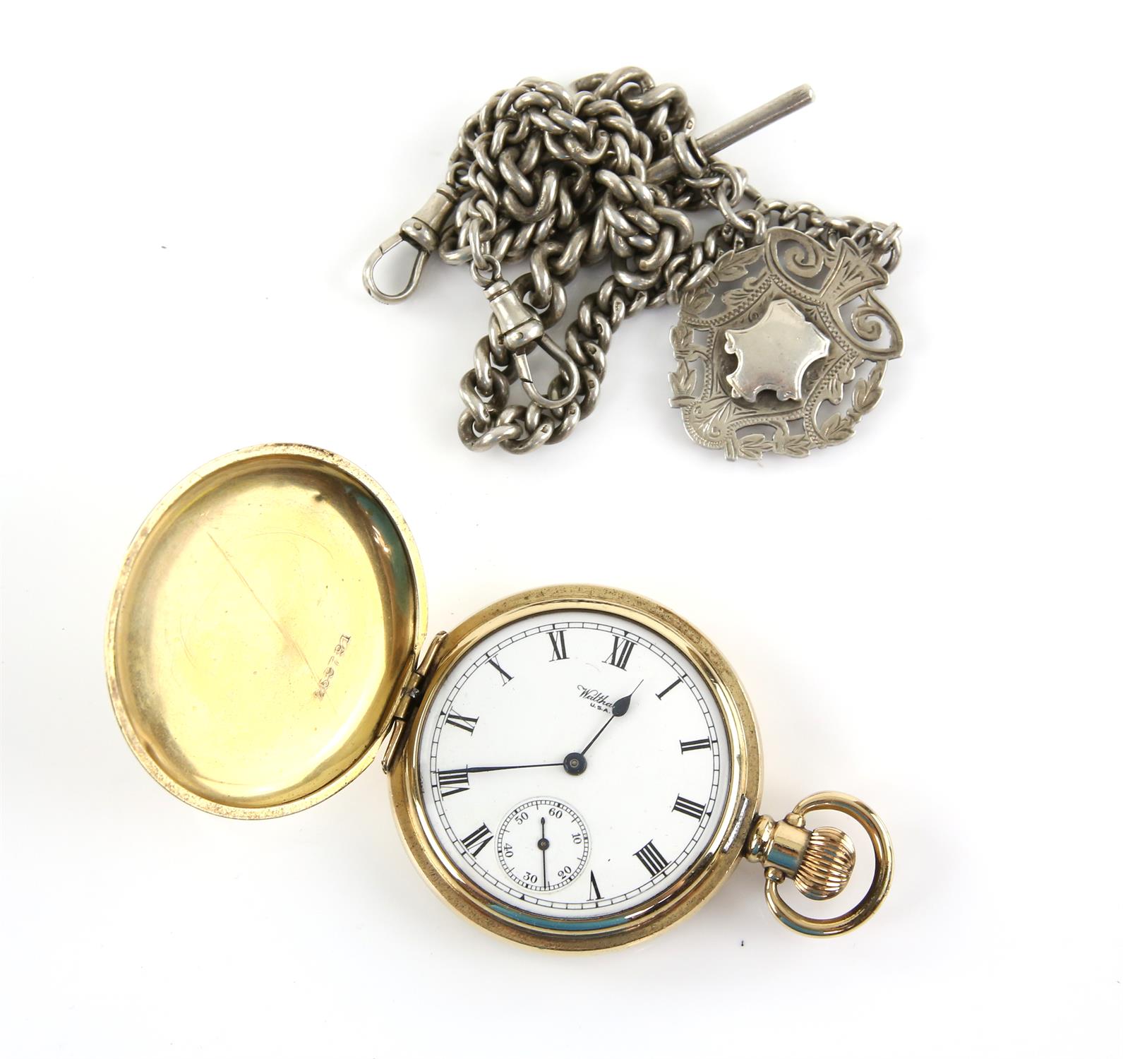 Waltham gold Hunter pocket watch, signed white enamel dial with Roman numeral hour markers,