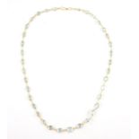 Aquamarine necklace, thirty six aquamarine of varying shapes and size, s clasp, estimated length 47