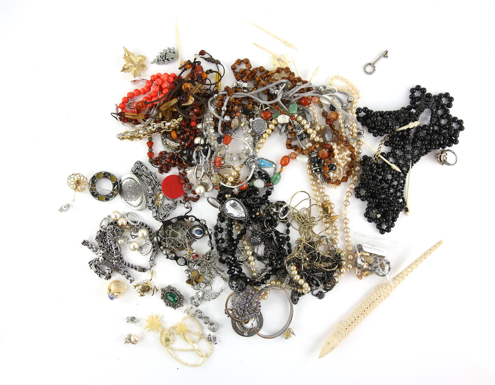 Bag of costume jewellery to include, a selection of carved bone items, coral bead necklace,