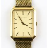Girad-Perregaux A gentleman's wrist watch, the rectangular signed brushed gold signed dial case