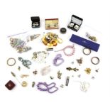 Large bag of costume jewellery including Swarovski crystal bracelet, quantity of tie pins,
