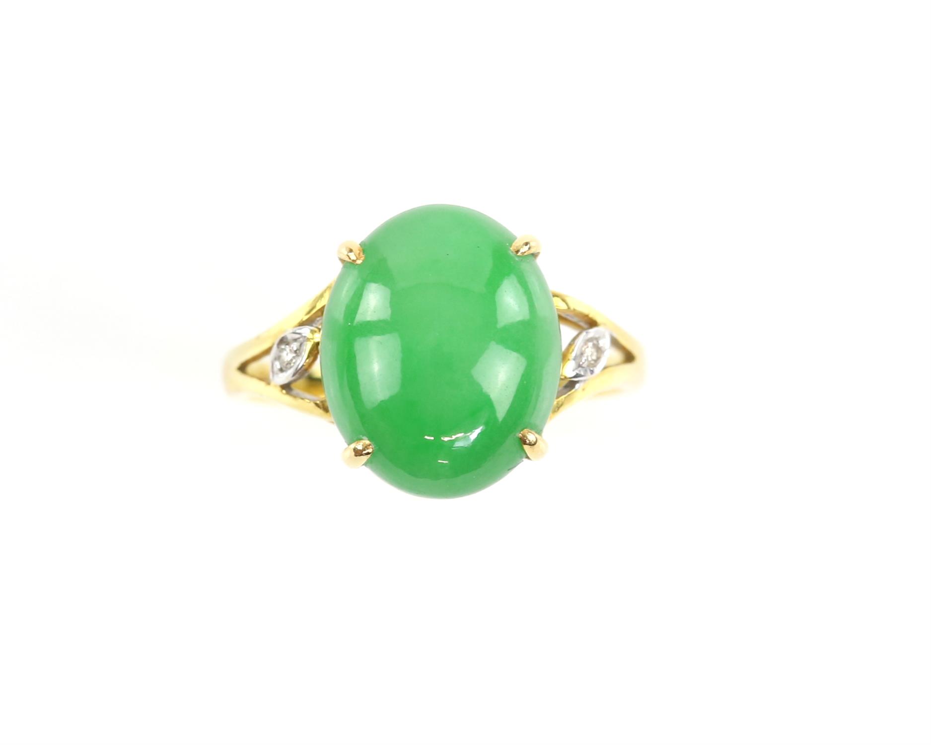 Jade and diamond ring, oval cabochon cut jade 13 x 10 mm, with round brilliant cut diamond set