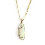 Opal pendant on a figaro chain, pendant measures estimated 3.5 x 1.5 cm at widest point and chain