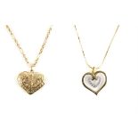 Two heart necklaces, including a filigree puff heart on a fancy link chain, in 9 ct,