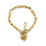 Fancy link charm bracelet, with a floral openwork heart clasp and safety chain, in 9 ct, length 20cm