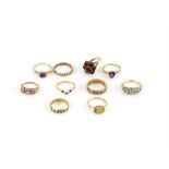 Ten gem set rings, including a garnet cluster ring, size N, a heart shaped ruby ring, size N,