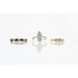 Three gem set rings, including a navette shaped diamond ring, in 14ct, ring size L1/2,