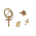 Two gold cross pendants and chains, both in 9 ct yellow gold and a rectangular gold plated locket 2.