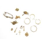 Selection of gold jewellery, including a gate bracelet, three pendants. two pairs of drop earrings,