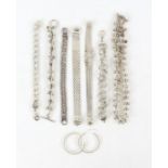 A group of silver jewellery items, included are, eleven necklaces, fourteen bracelets and one pair