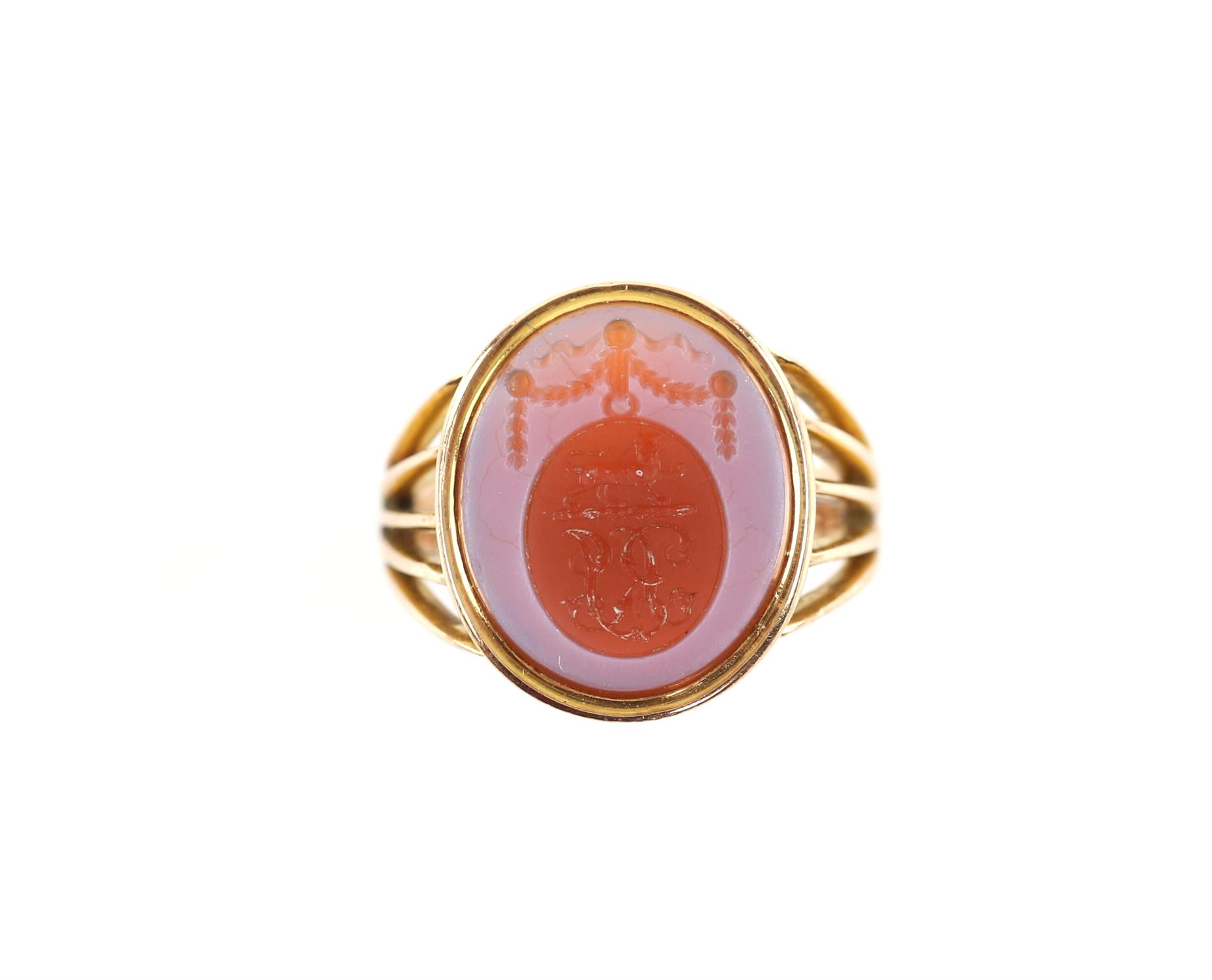 Victorian agate signet ring, with seal engraving, depicting a standing lion and scrolled initials