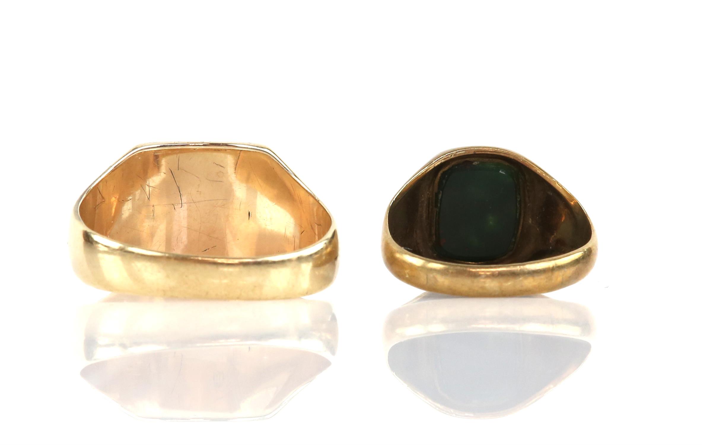 Two signet rings, one is a plain square shaped signet ring, stamped 14 ct gold, ring size T and a - Image 2 of 2