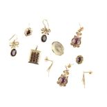 A mixed group of items, including a pair of cabochon cut garnet drop earrings, two pairs of red