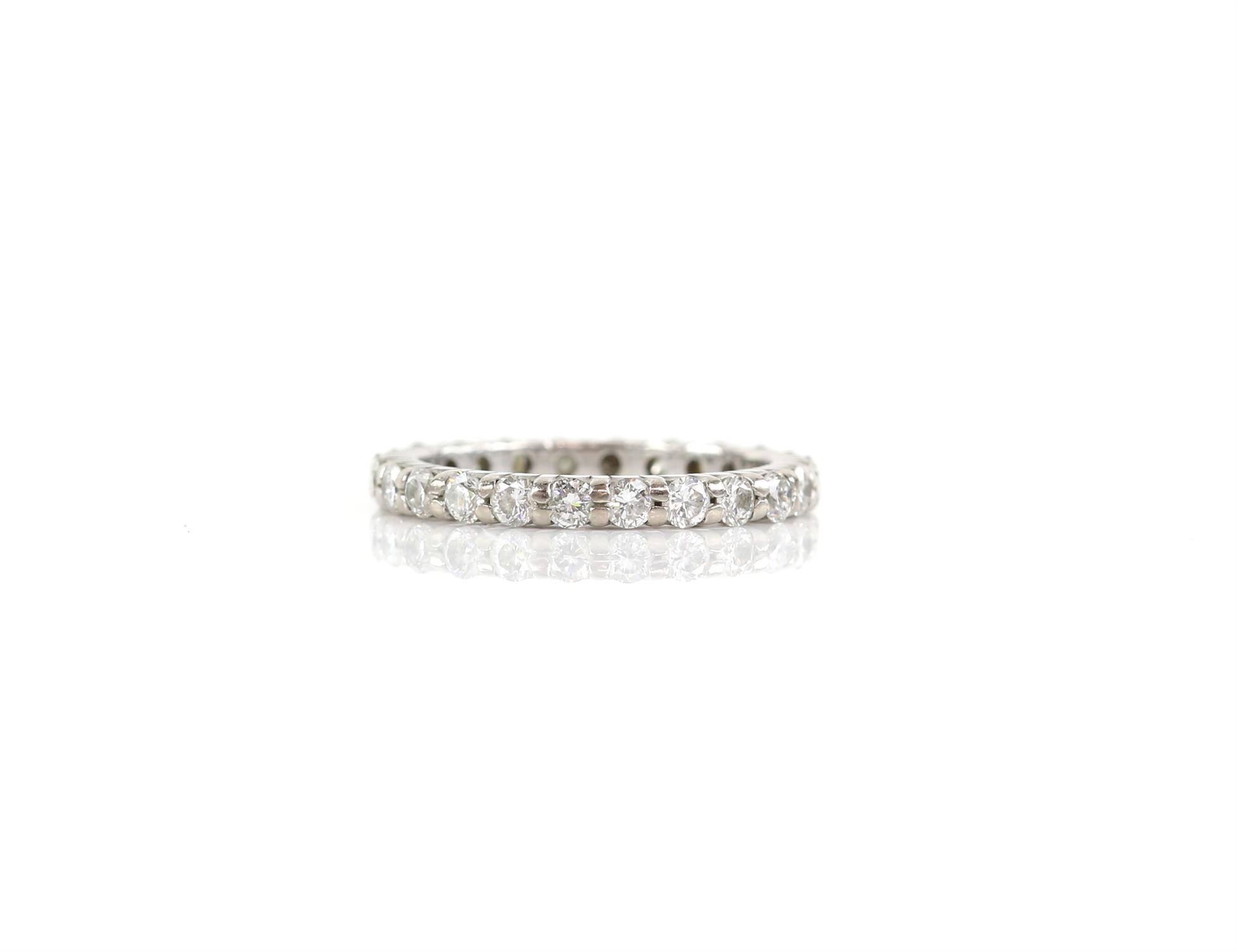 Diamond full eternity ring, twenty-four round brilliant cut diamonds, weighing an estimated total