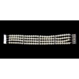 Pearl and diamond bracelet, four rows of cultured white pearls, measuring 5.8mm in diameter,