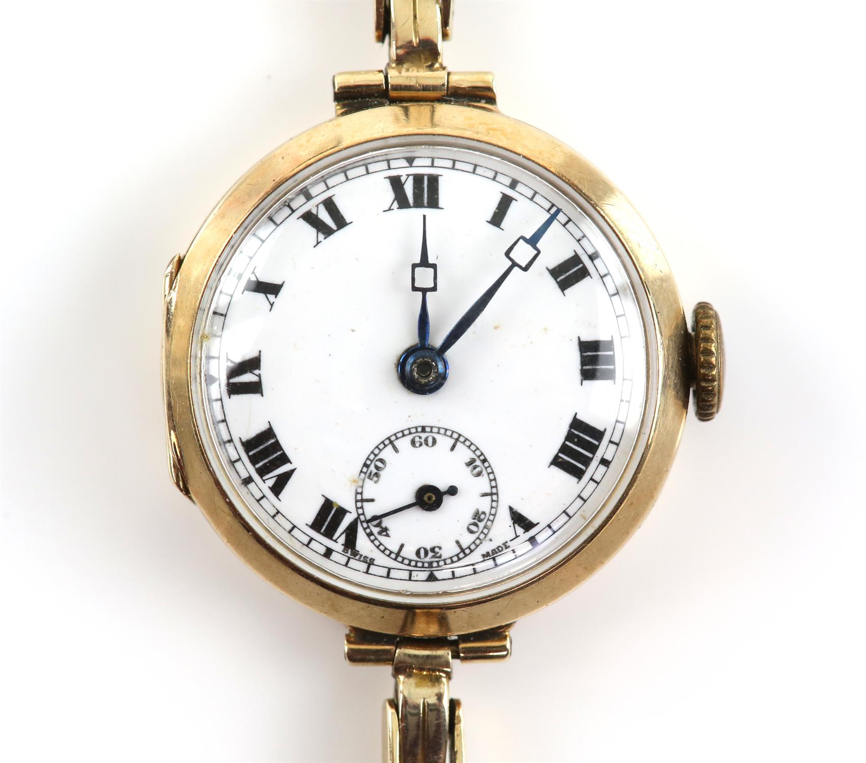 Vertex watch company, a ladies gold wristwatch, the circular enamelled dial with Roman numeral hour