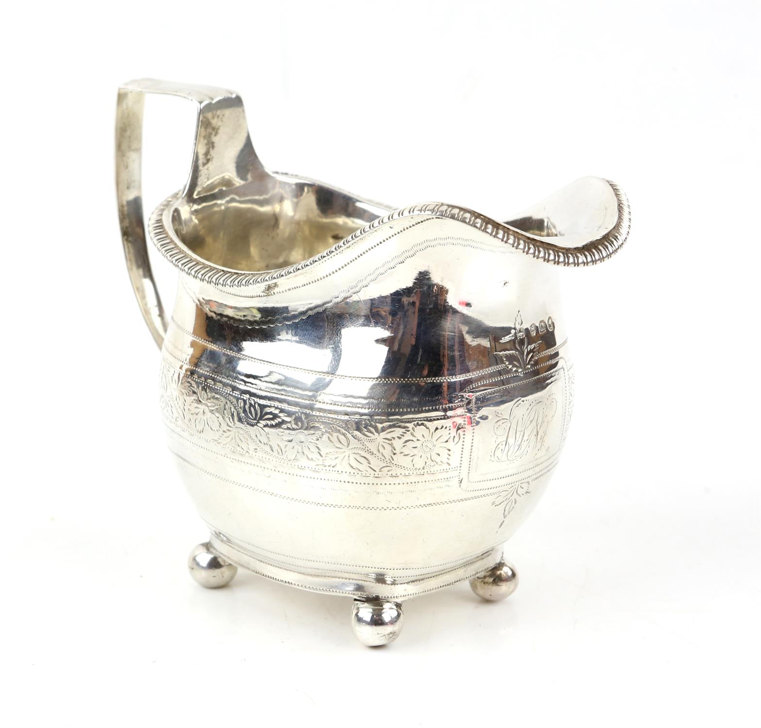 George III oval shaped silver cream jug with bright cut foliate scroll band, London 1811, - Image 2 of 3