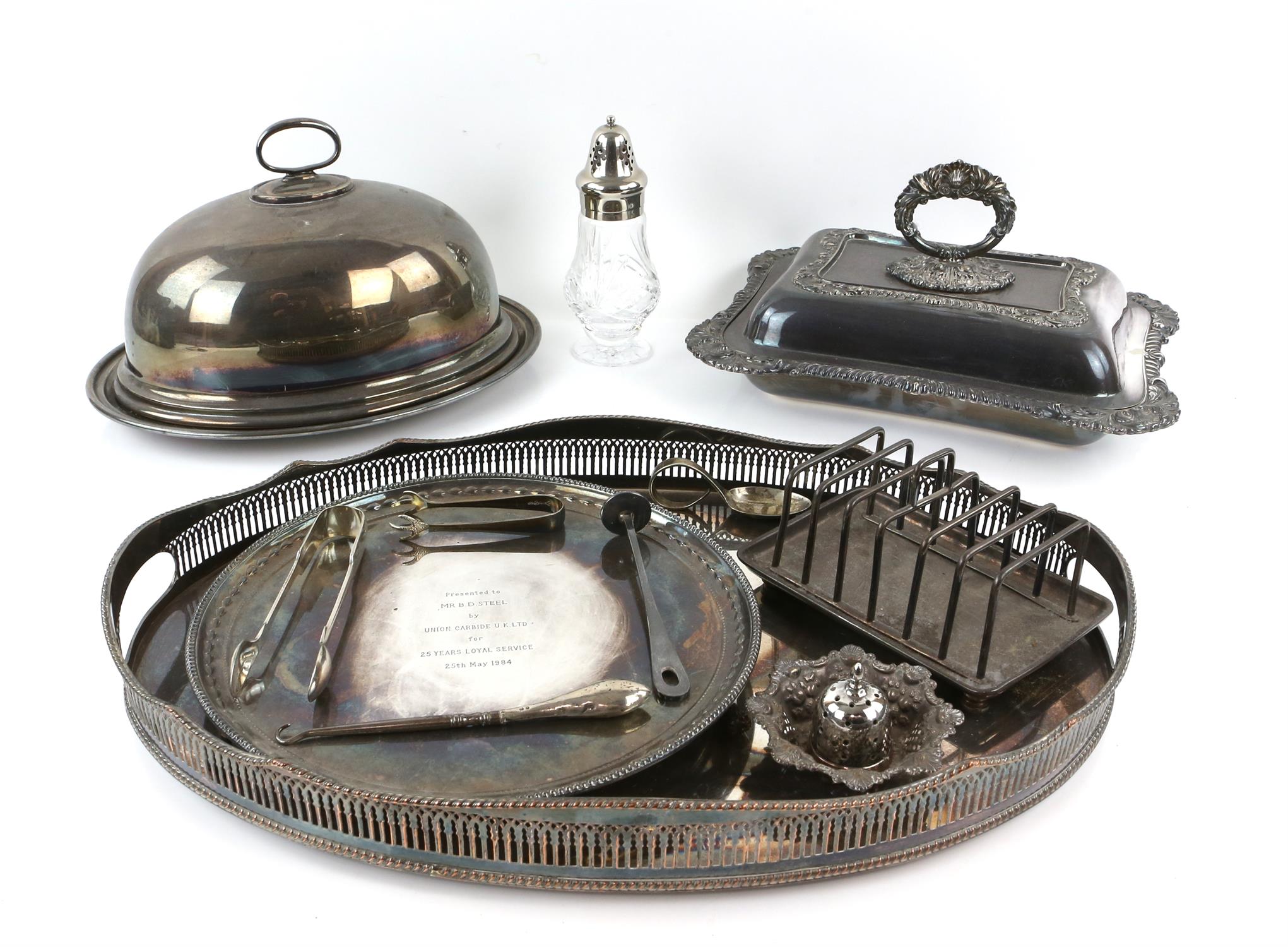 Silver plated wares to include a galleried tray, entree dish and cover, toast rack and other items,