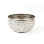 Far Eastern silver bowl with hammered and embossed decoration of repeating shells on plinths, 17.