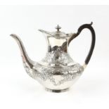 "Harrods" silver coffee pot with embossed foliate decoration, London 1918, gross weight, 29oz,