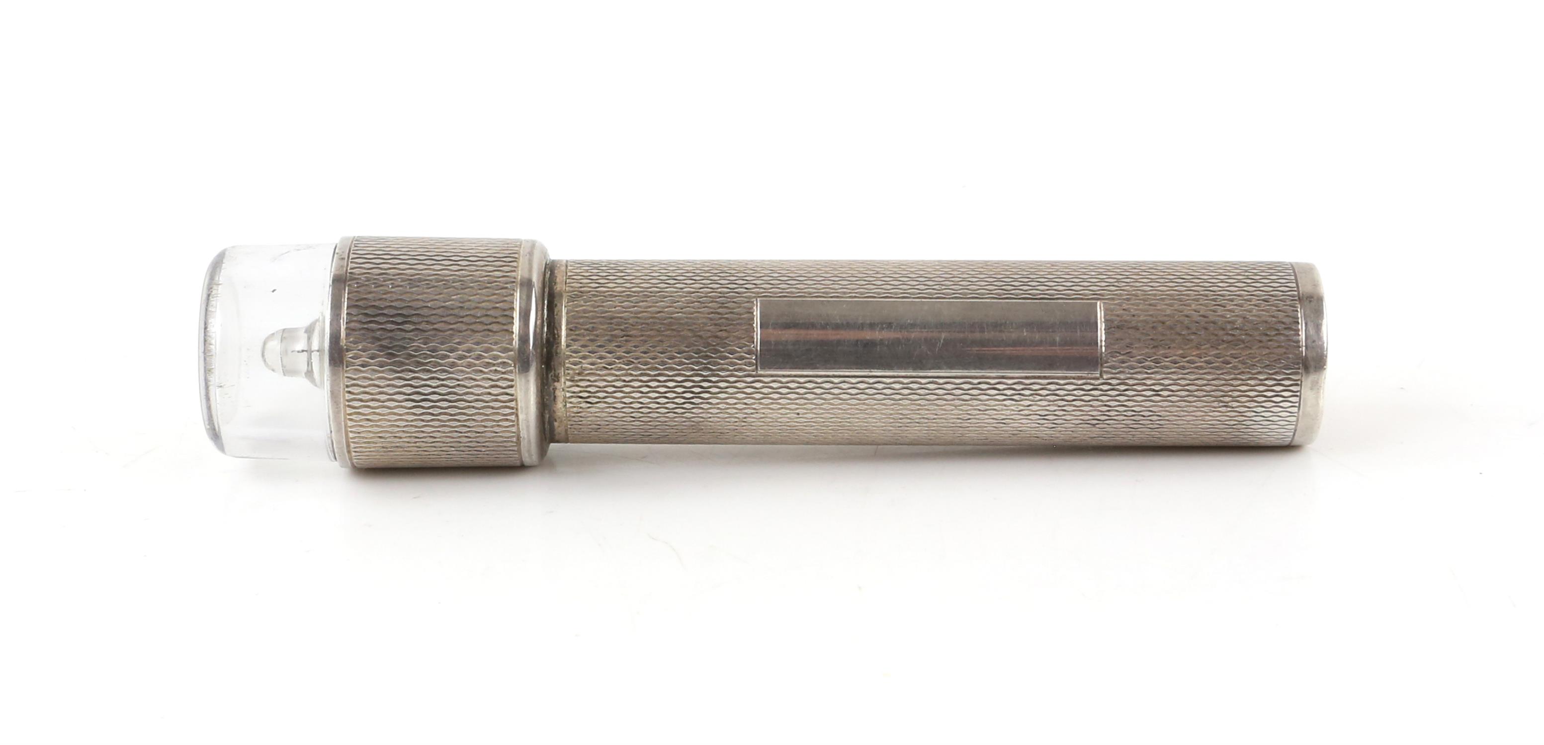 Large silver hand held torch with an engine turned finish and a rectangular vacant cartouche by TP, - Image 2 of 4