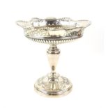 Silver pedestal fruit stand with pierced foliate rim, and fluted bowl by Martin, Hall & Co,