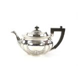 Victorian silver teapot with bulbous form and gadrooned decoration, by Mark Willis, Sheffield, 1896,