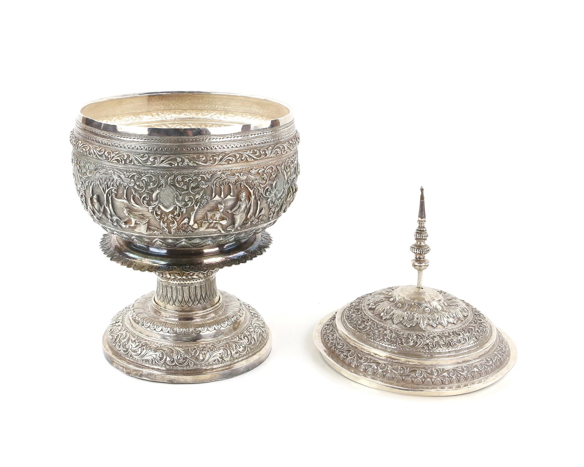 Burmese white metal pedestal bowl and cover with embossed figural and scrolling foliate decoration, - Image 2 of 6