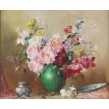 Still life, flowers in a green vase, oil on canvas, signed indistinctly in the bottom right corner,