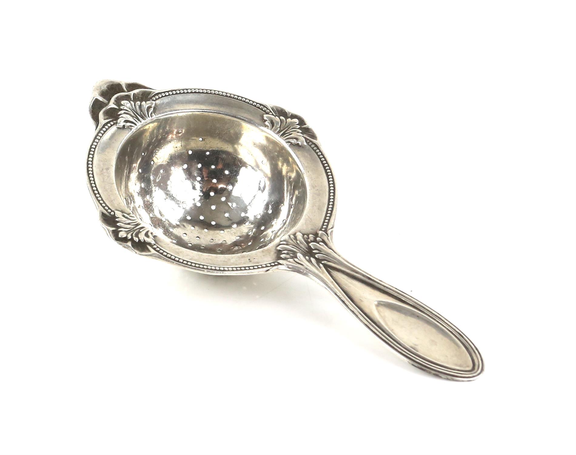 Continental silver caddy spoon and an 830 grade silver tea strainer - Image 2 of 4