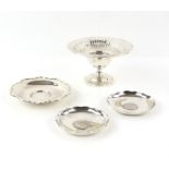 George V silver miniature circular comport with pierced decoration, filled base, maker's mark 'WB',