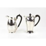 Edward VII silver coffee-pot, the plain baluster body with ebonised handle and finial,