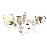 Silver plated wares, to include a cocktail shaker, toast rack, soup ladle and other items,