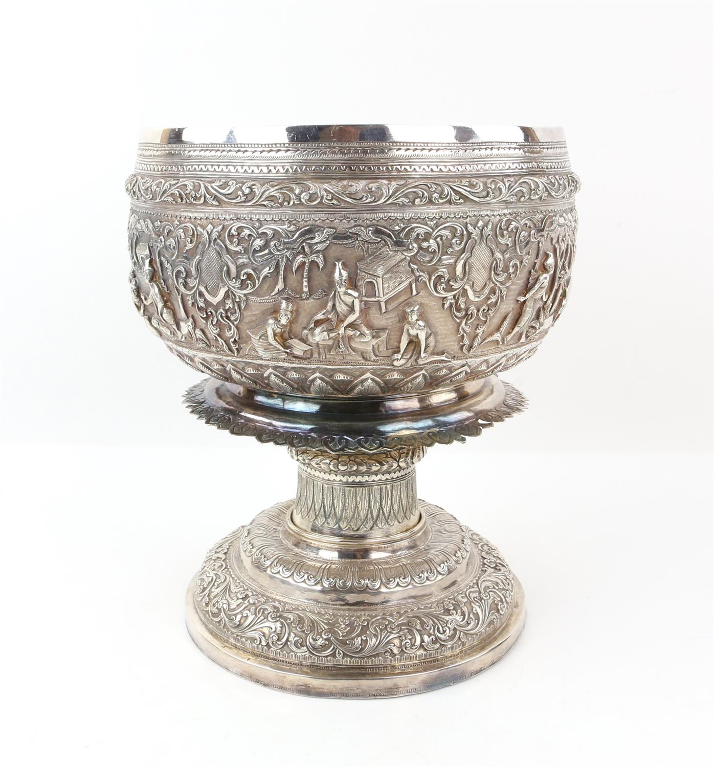 Burmese white metal pedestal bowl and cover with embossed figural and scrolling foliate decoration, - Image 6 of 6