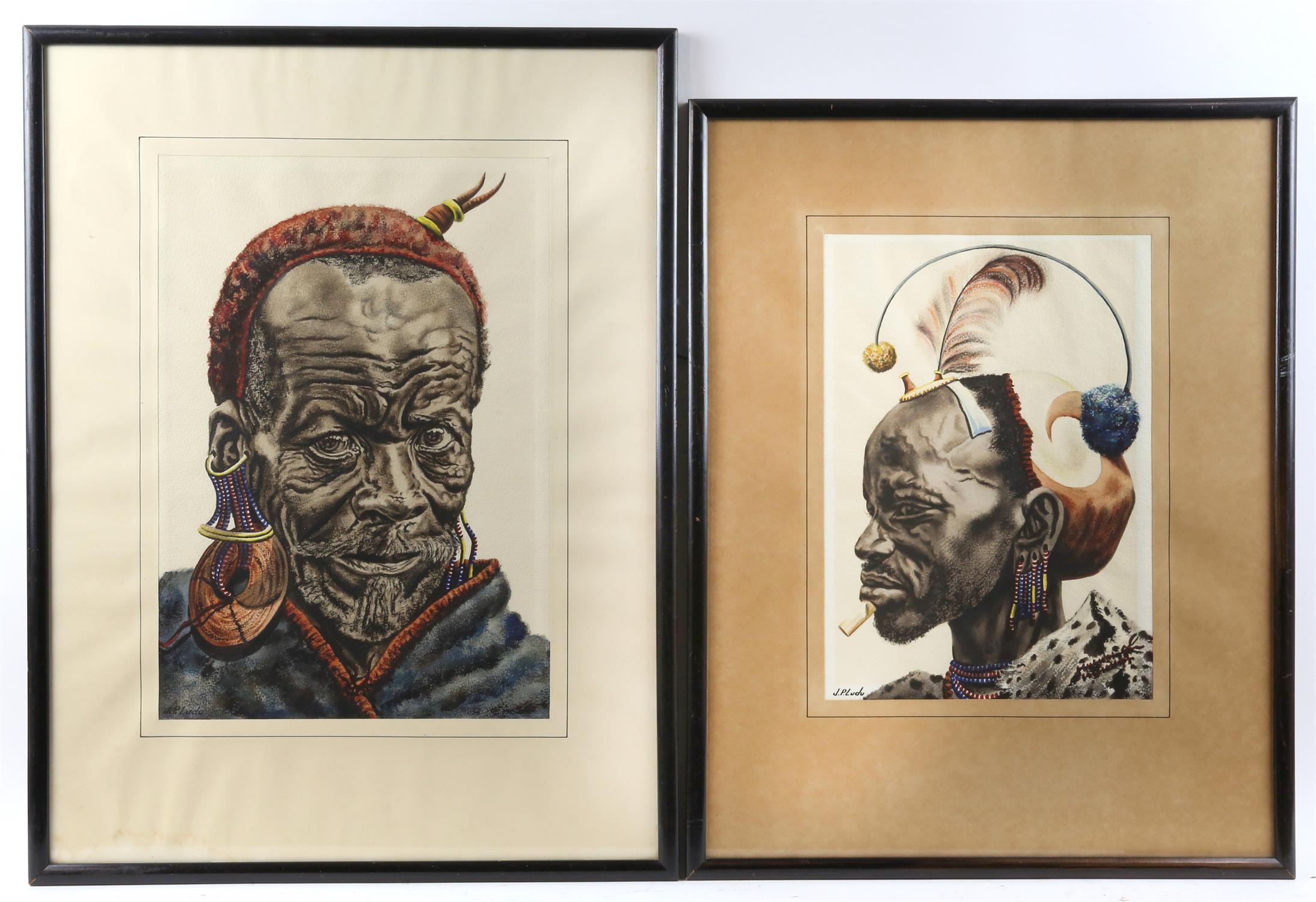 J P Ludu, 20th century, two portraits of African tribal elders, signed, watercolours, 42 x 28.