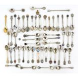 Group of mostly silver-plated travel teaspoons, some enamelled, some gilt