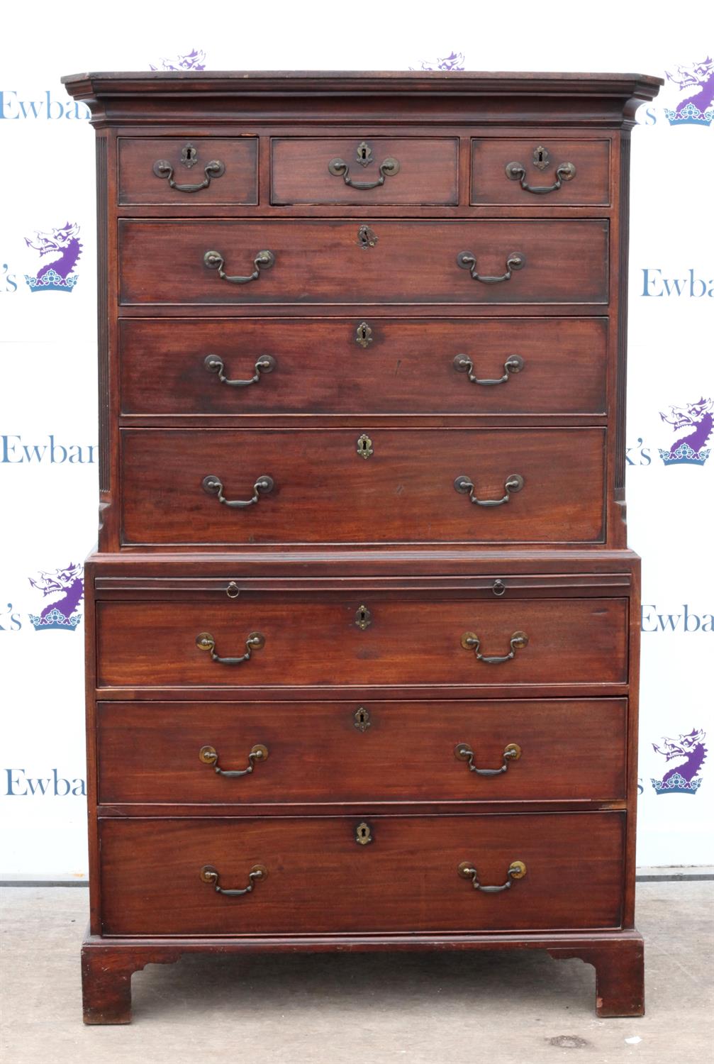 George III mahogany chest on chest, with three short drawers over six long drawers on bracket base,