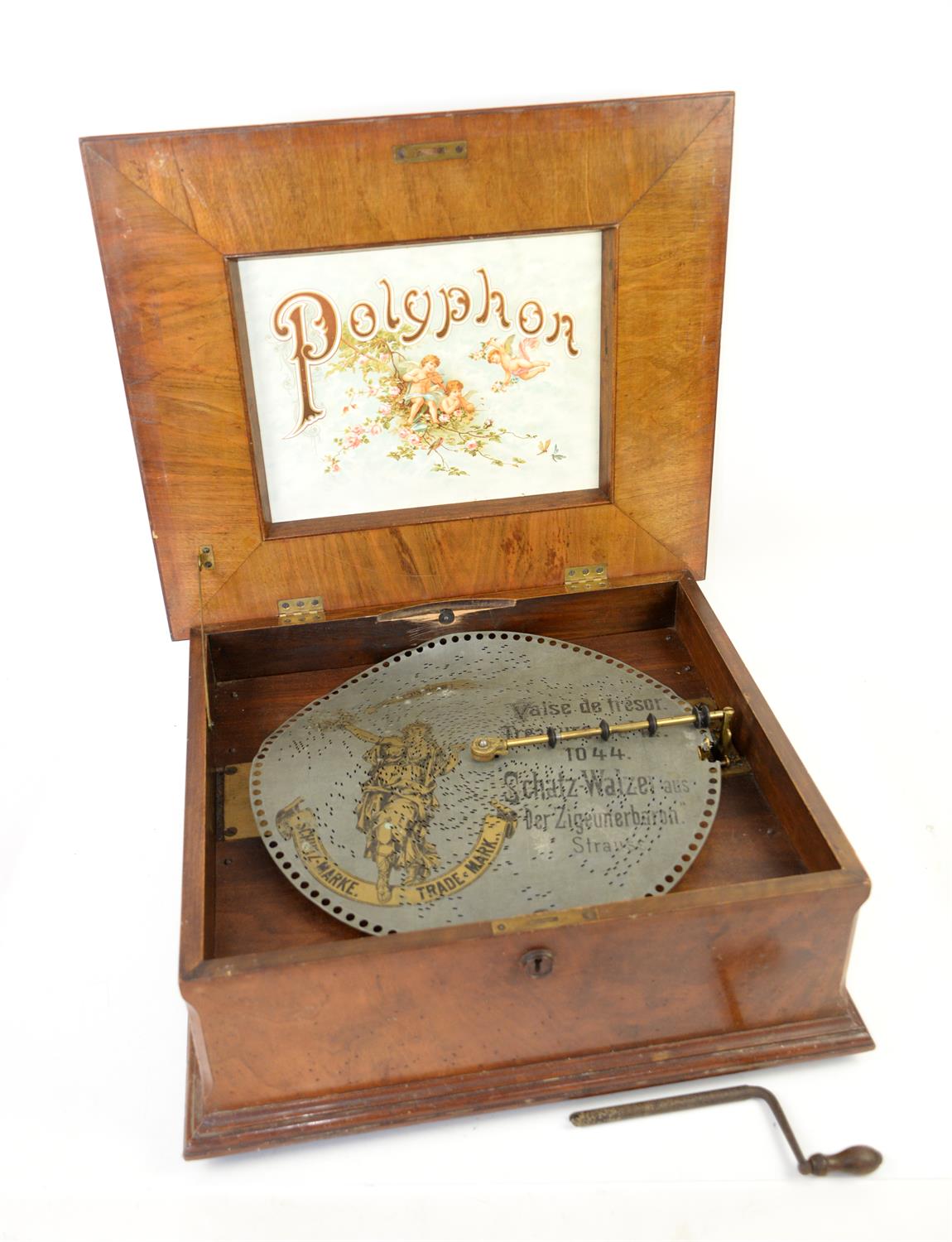 Late 19th century Polyphon with approx thirty five d discs. the cylinder 17 cms Stamped 22934 the