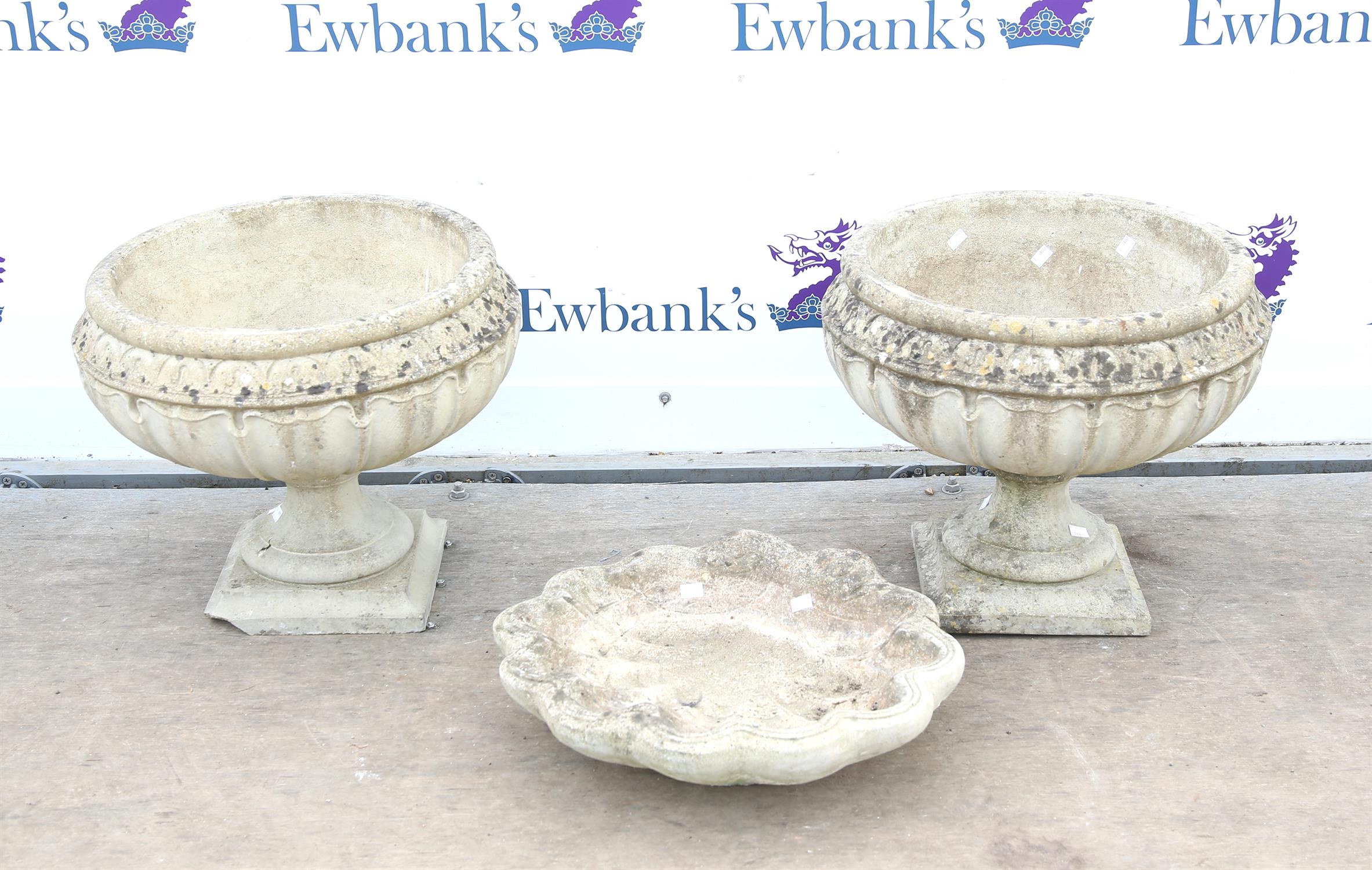 Pair of reconstituted stone planters floral design on socle bases with makers mark HGC 56cm