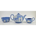 Wedgwood blue Jasperware teapot h13cm 23cm diam, cream jug and sugar bowl, impressed marks to base