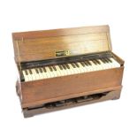 Oak cased portable harmonium, with label to interior 'UNEX Sunday School Union, 56 Ludgate Hill,