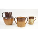 Doulton Lambeth stoneware hunting jug h21cm, a similar two handled jug and a mug,