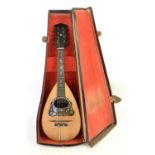 Rosewood and spruce mandolin in fitted case by Barnes and Mullins, overall length 60 cm