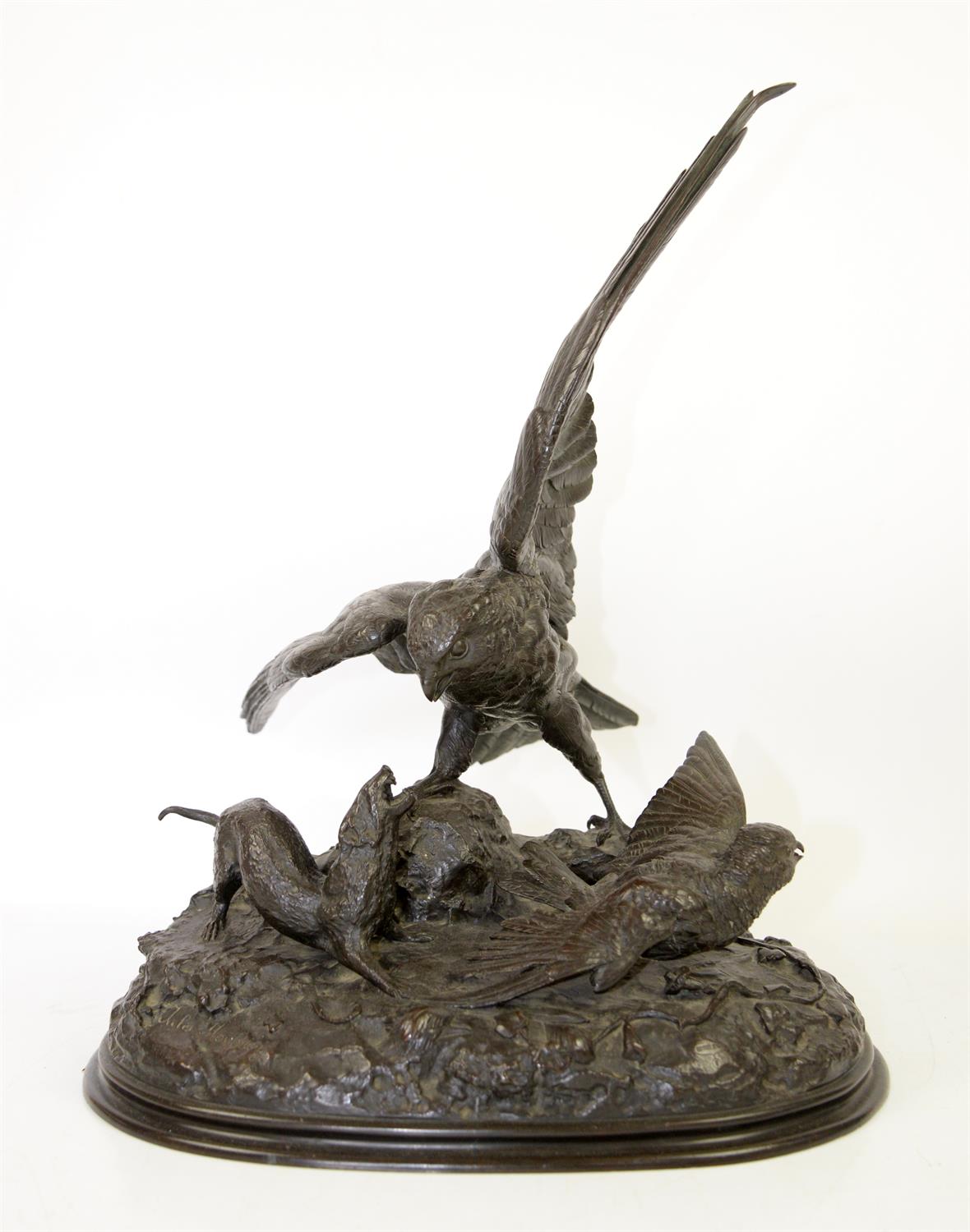 After Jules Moigniez, bronze figural group of an eagle defending its young, on naturalistic base,