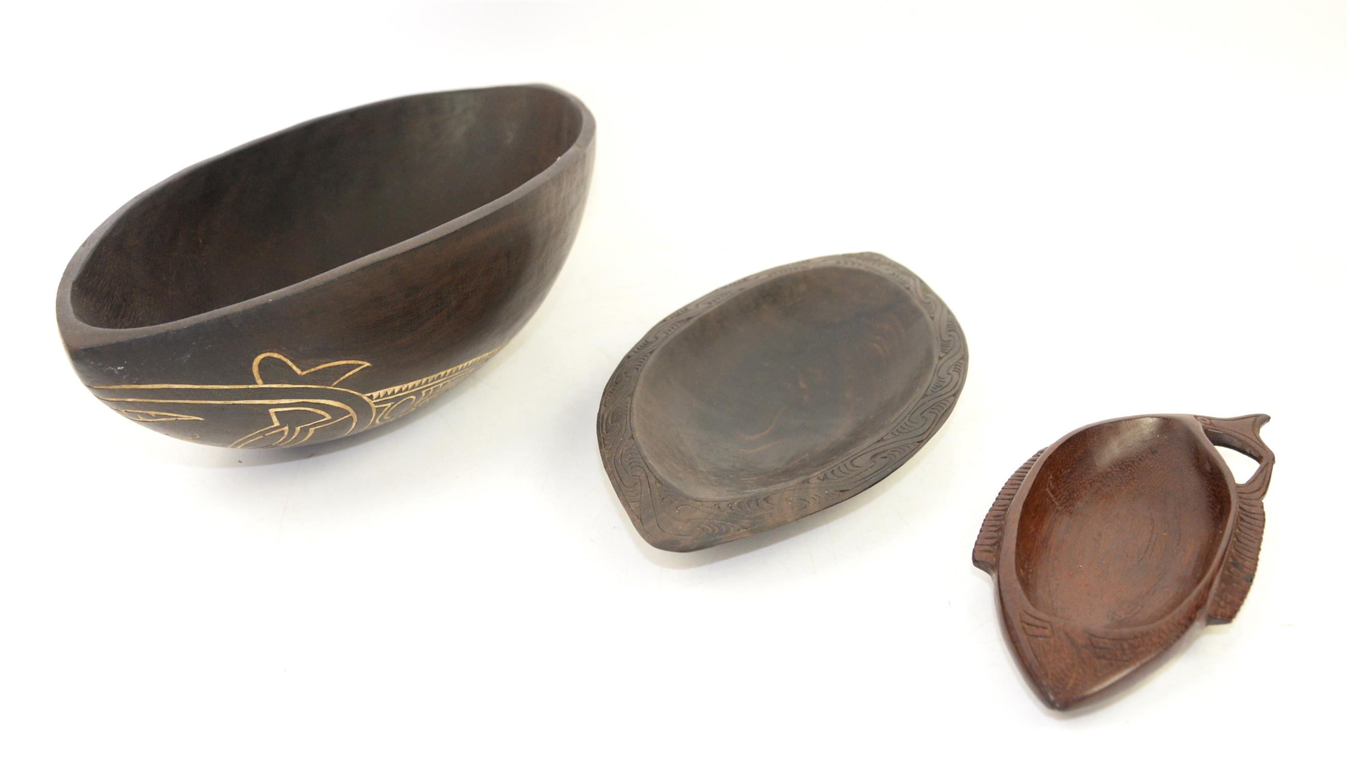 Three Papua New Guinea bowls, to include a Trobriand Islands hardwood bowl in the form of a fish,